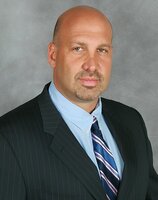 Marc D Grossman